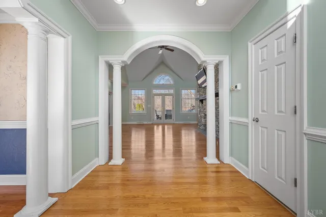 a view of kitchen with kitchen island and stainless steel appliances