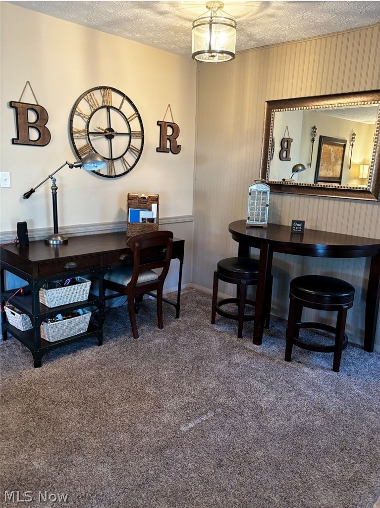 2514 Raber Road, Unit 4A Uniontown, OH 44685 - Photo 6 of 13 Office area featuring dark carpet and a textured ceiling