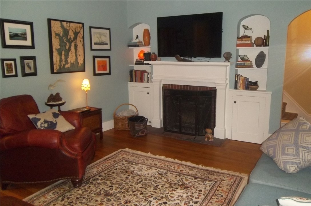 619 Boston Neck Road North Kingstown, RI 02852 - Photo 3 of 36 Living room with hardwood floors and built-ins