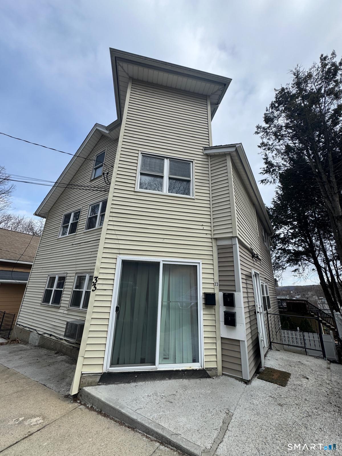 33 Pond Street Naugatuck, CT 06770 - Photo 8 of 8 a front view of a house