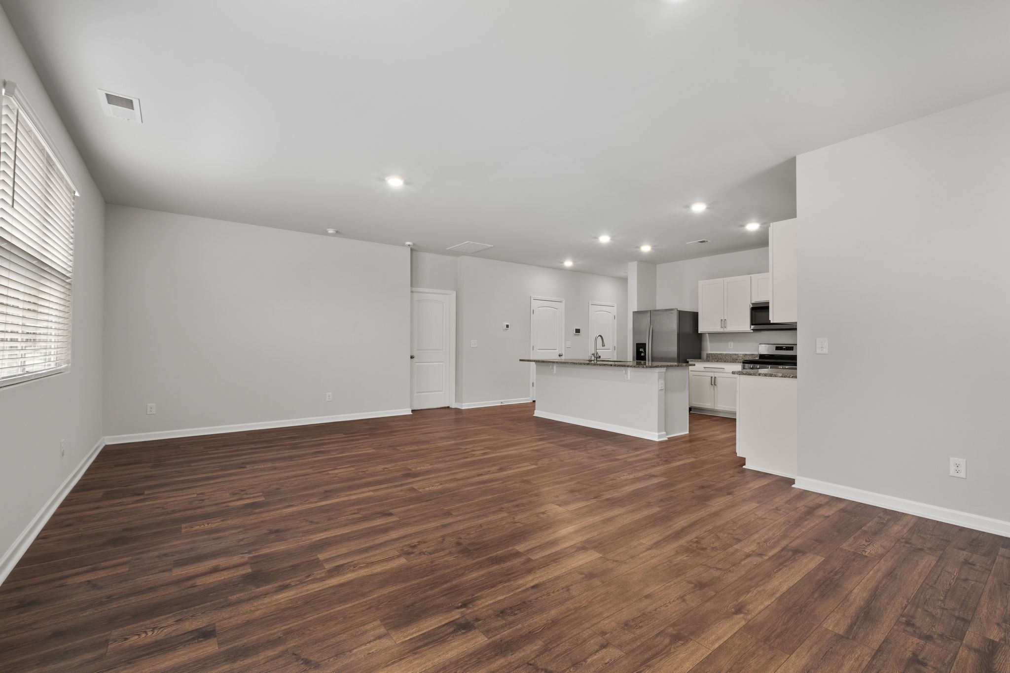 626 Pine Bloom Road Lebanon, TN 37087 - Photo 10 of 39 a view of kitchen with kitchen island sink and refrigerator