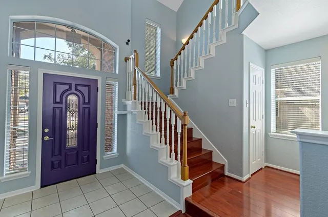 a view of an entryway with staircase