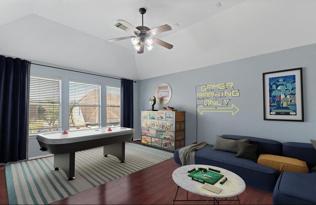 2611 South Breeze Drive Manvel, TX 77578 - Photo 8 of 20 a living room with furniture and a large window