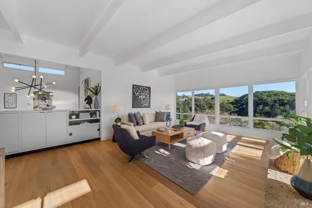a view of balcony with wooden floor
