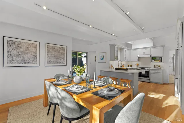 a bed room with a bed and a chair