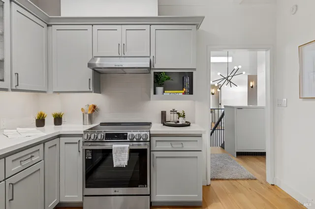 a bedroom with a bed and a table