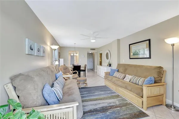 a living room with furniture and a couch