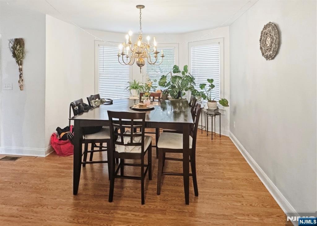 68 Washington Avenue Rutherford, NJ 07070 - Photo 3 of 23 a view of a dining room with furniture and chandelier