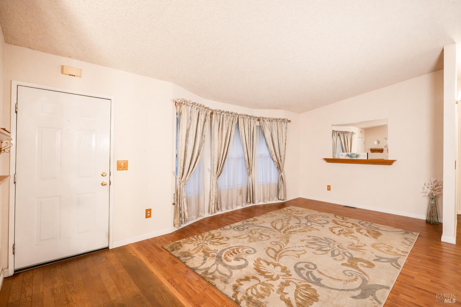 2555 Flosden Road, Unit 117 American Canyon, CA 94503 - Photo 10 of 36 a bedroom with a bed and a window