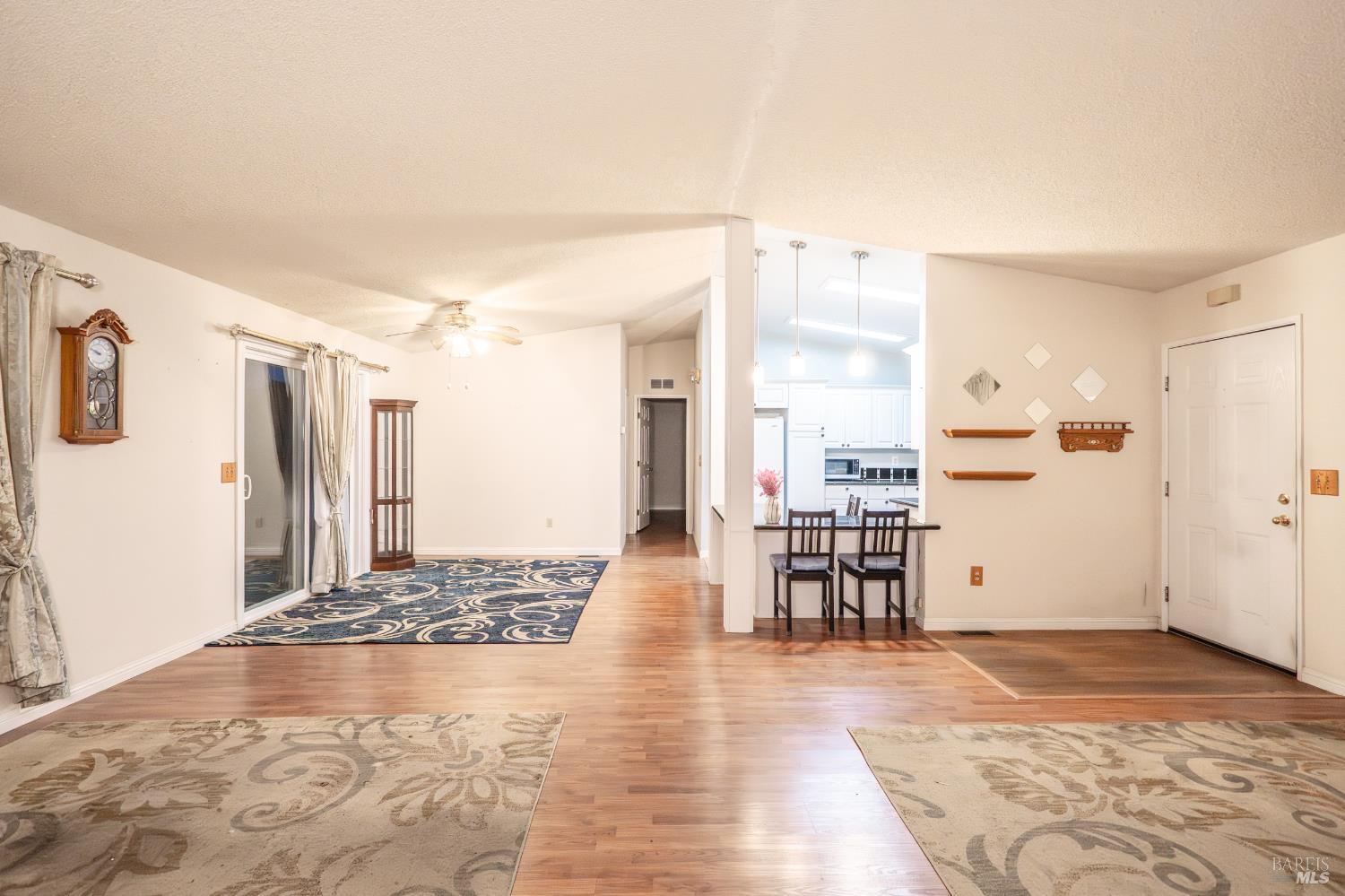 2555 Flosden Road, Unit 117 American Canyon, CA 94503 - Photo 36 of 36 a view of a livingroom with furniture and kitchen view