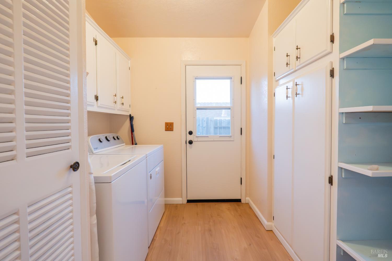 2555 Flosden Road, Unit 117 American Canyon, CA 94503 - Photo 22 of 36 a view of a kitchen with a sink and refrigerator