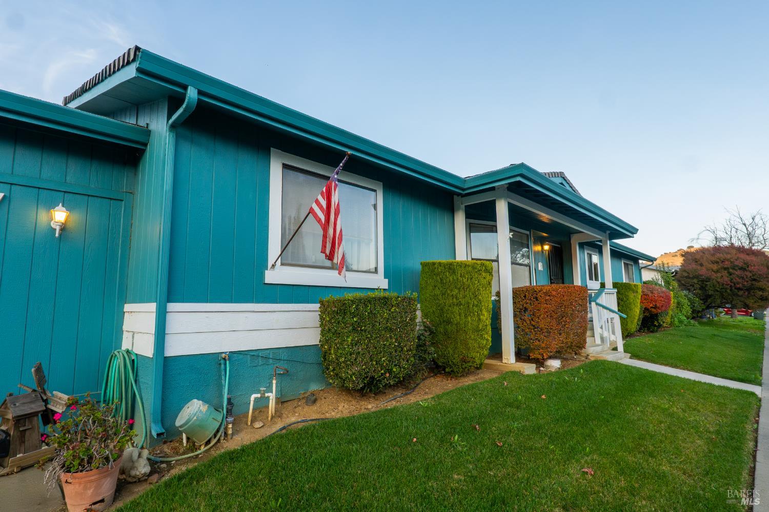 2555 Flosden Road, Unit 117 American Canyon, CA 94503 - Photo 27 of 36 a front view of a house with garden