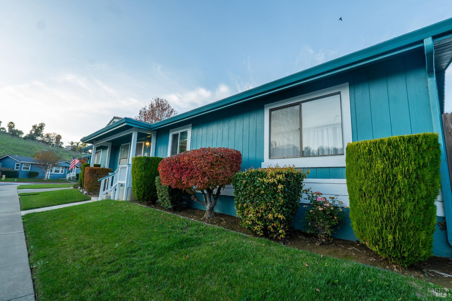 2555 Flosden Road, Unit 117 American Canyon, CA 94503 - Photo 28 of 36 a front view of a house with garden