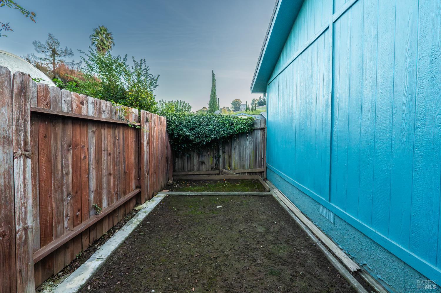 2555 Flosden Road, Unit 117 American Canyon, CA 94503 - Photo 32 of 36 a view of a backyard with pathway