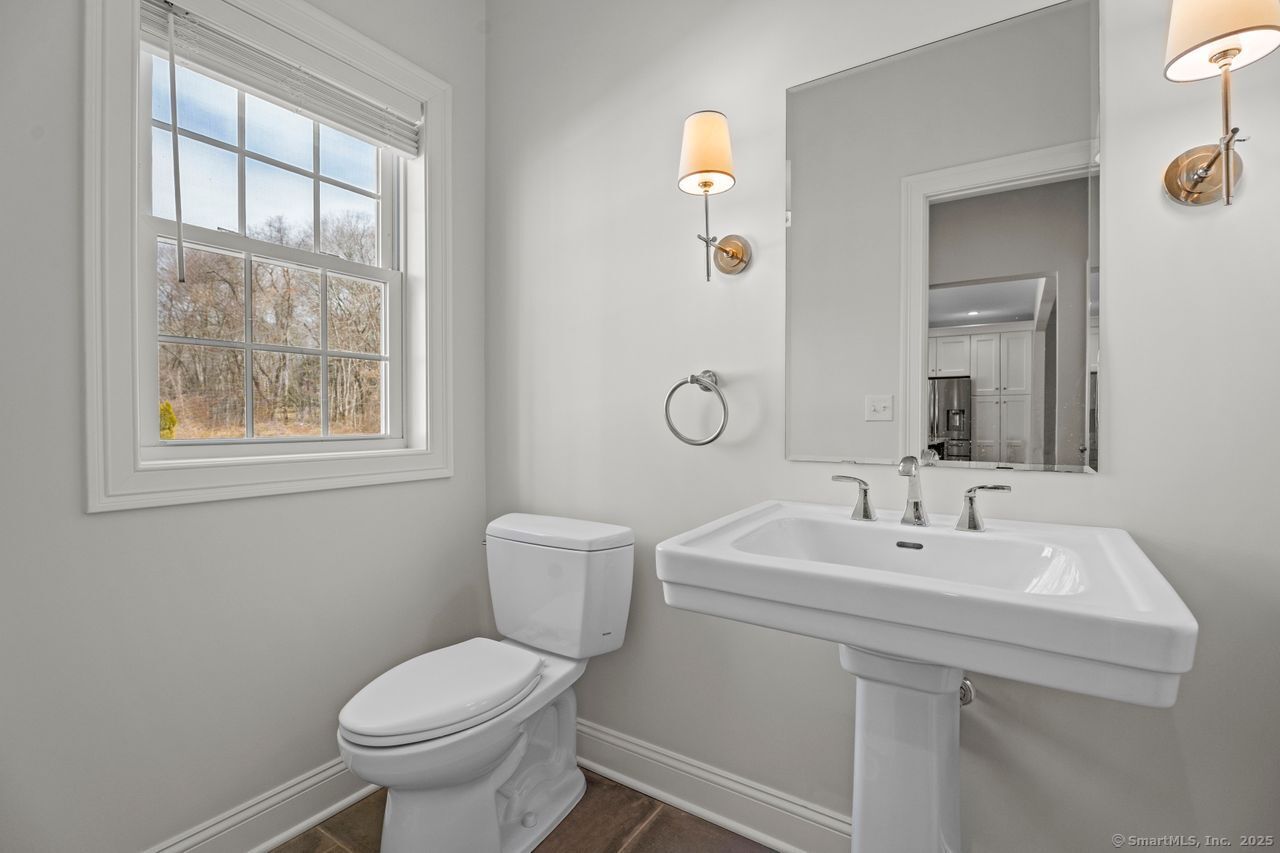 67 Boston Post Road, Unit 8 Madison, CT 06443 - Photo 17 of 35 First floor bathroom with classic style