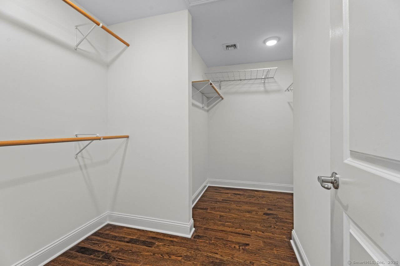 67 Boston Post Road, Unit 8 Madison, CT 06443 - Photo 24 of 35 Walk-in closet for the primary bedroom