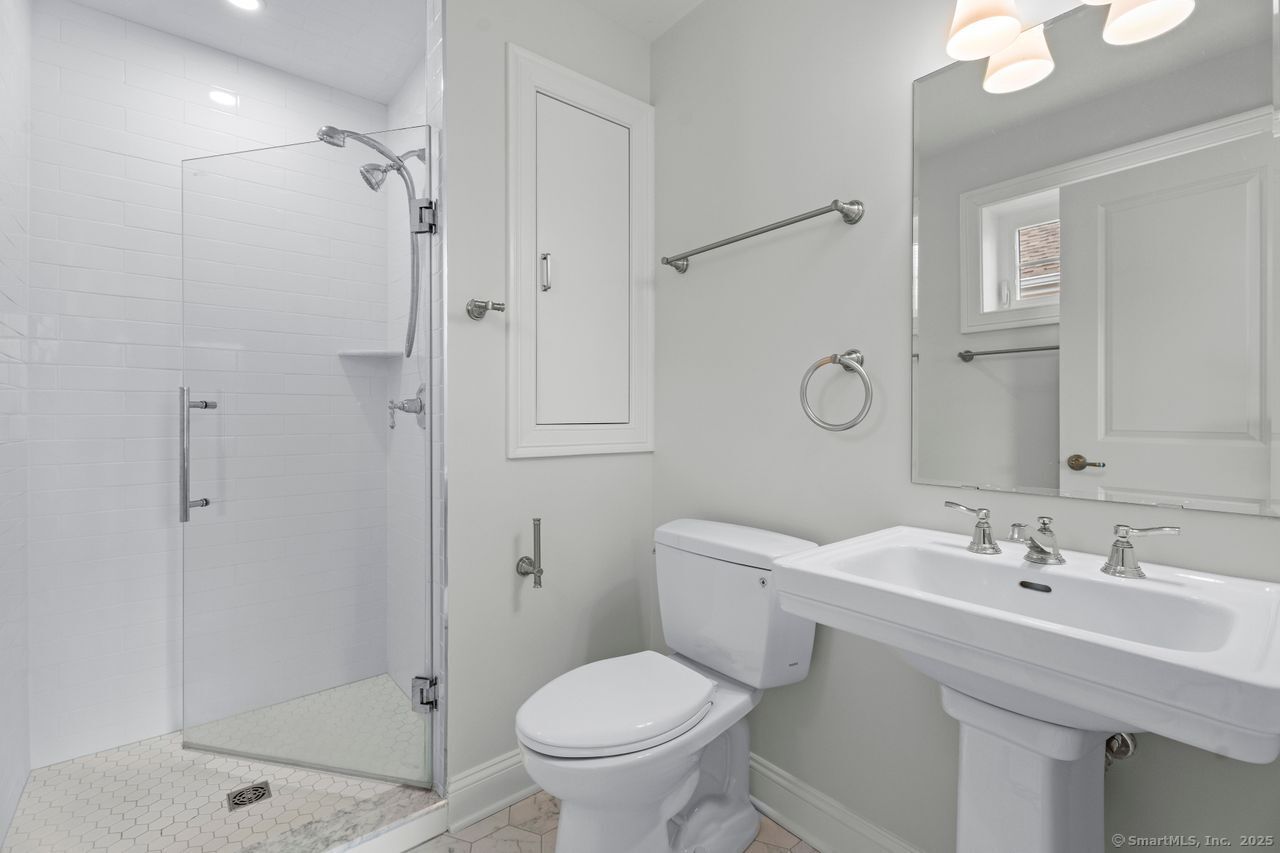 67 Boston Post Road, Unit 8 Madison, CT 06443 - Photo 4 of 35 This full bath is located in the second bedroom.