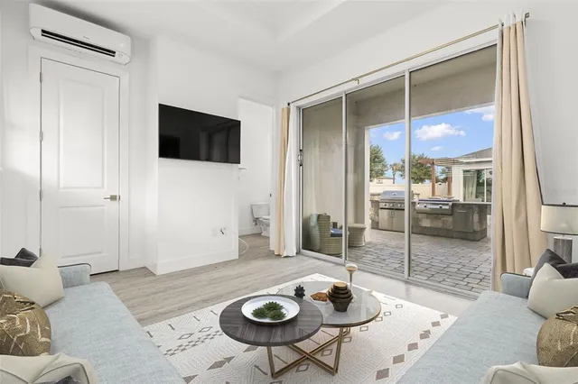 a view of a livingroom with a flat screen tv