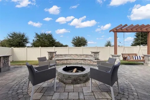 a view of a backyard of the house