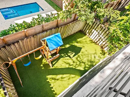 a view of swimming pool from a balcony
