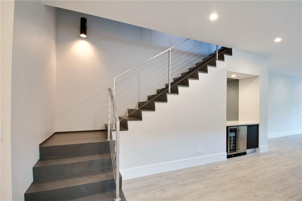317 Northeast 15th Avenue, Unit 317 Fort Lauderdale, FL 33301 - Photo 4 of 26 a view of entryway and hall with wooden floor
