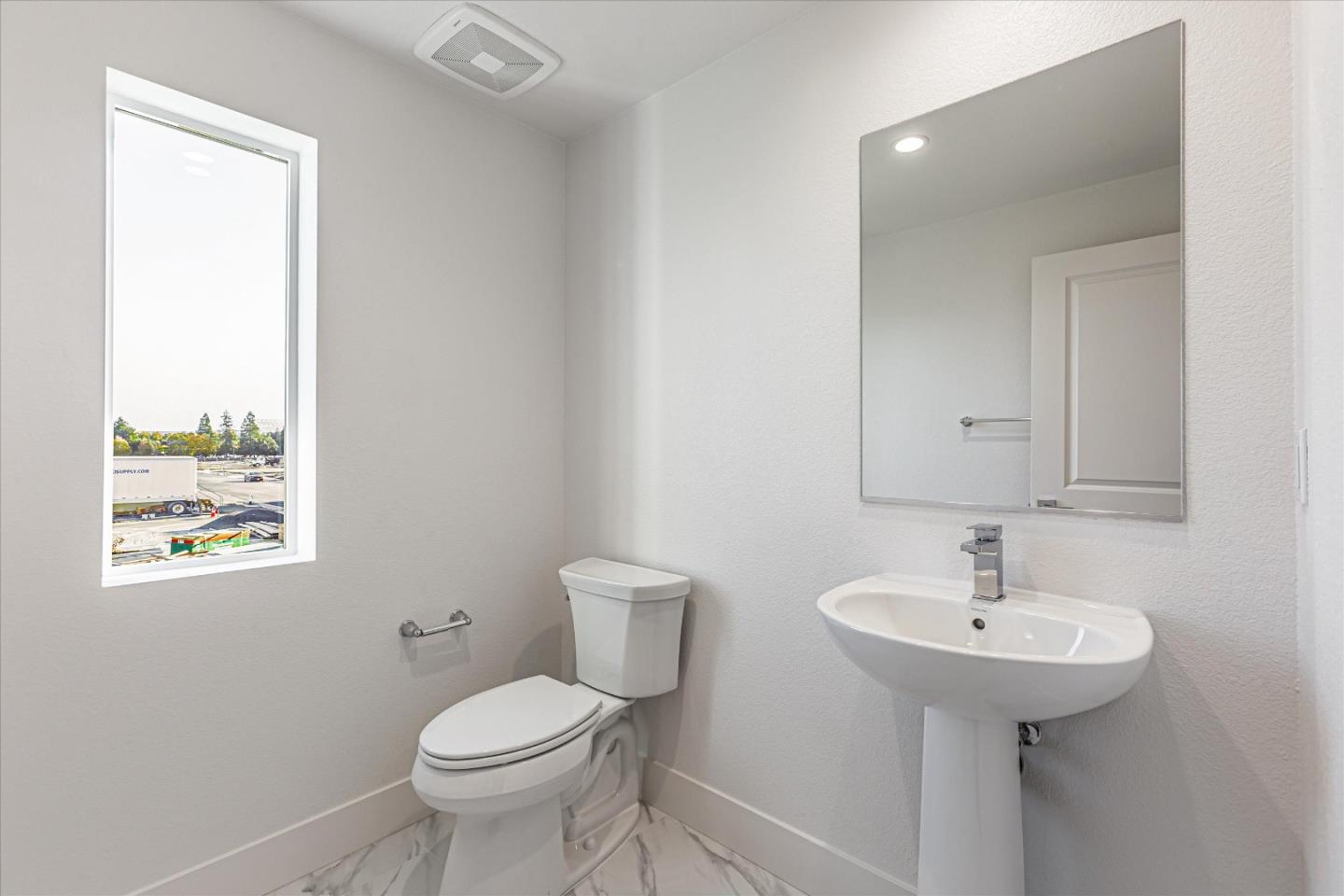 6008 Sunglow Terrace San Ramon, CA 94583 - Photo 15 of 23 a bathroom with a toilet sink and mirror