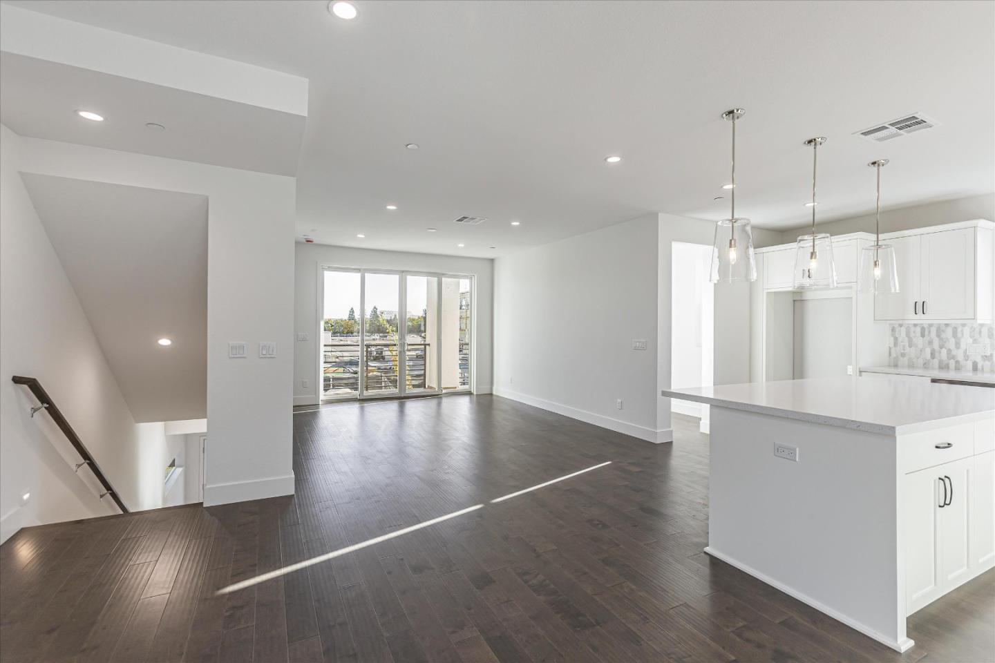 6008 Sunglow Terrace San Ramon, CA 94583 - Photo 8 of 23 a view of an empty room with wooden floor and a window