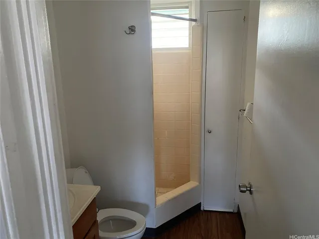 a bathroom with a sink and toilet