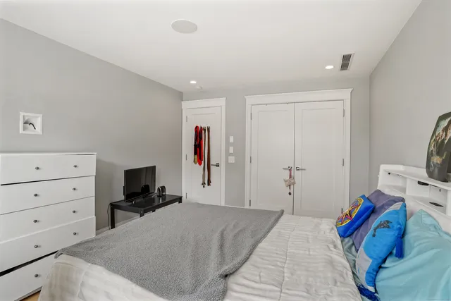 a view of a hallway to rooms and stairs