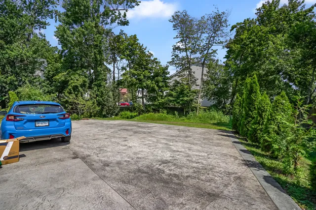 a view of a swimming pool with a sitting area