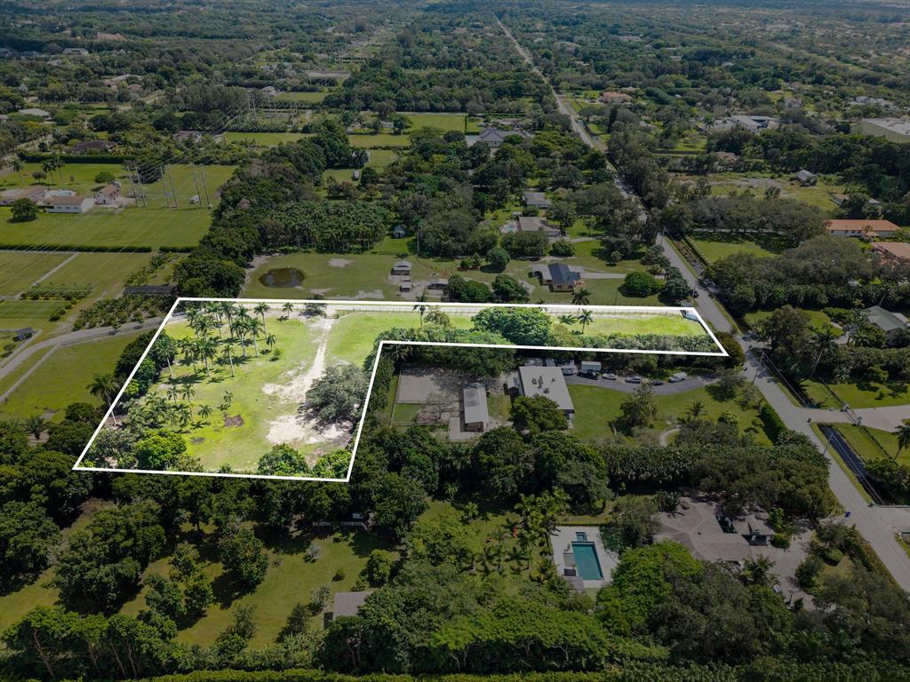 14501 Mustang Trail Southwest Ranches, FL 33330 - Photo 5 of 12 an aerial view of house with yard swimming pool and outdoor seating