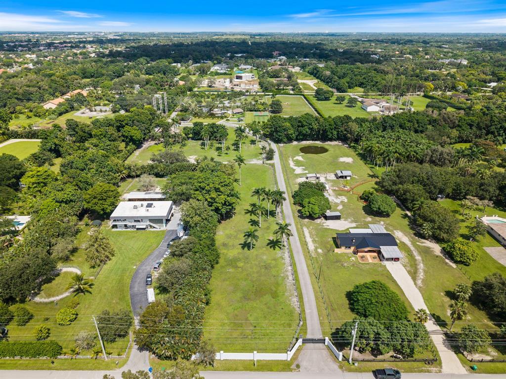 14501 Mustang Trail Southwest Ranches, FL 33330 - Photo 8 of 12 an aerial view of residential houses with outdoor space