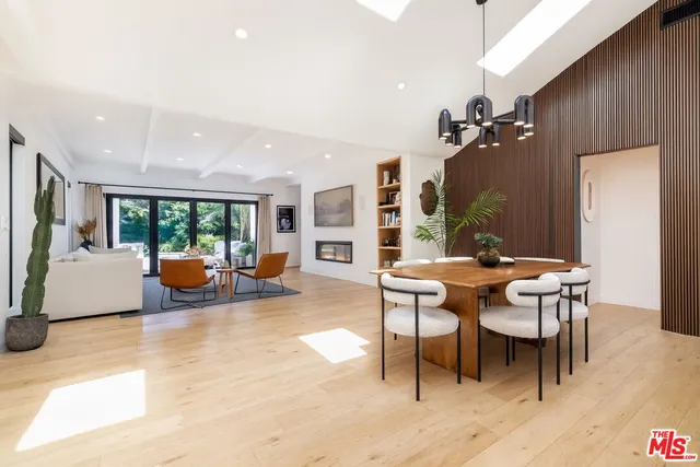 a view of a dining room with furniture and a livingroom