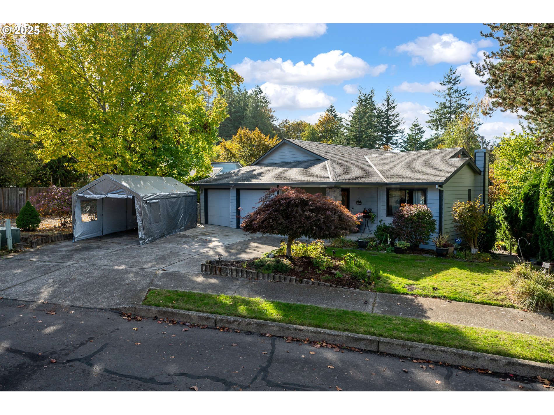 1963 Southwest Myers Place Gresham, OR 97080 - Photo 1 of 43 a front view of a house with a yard