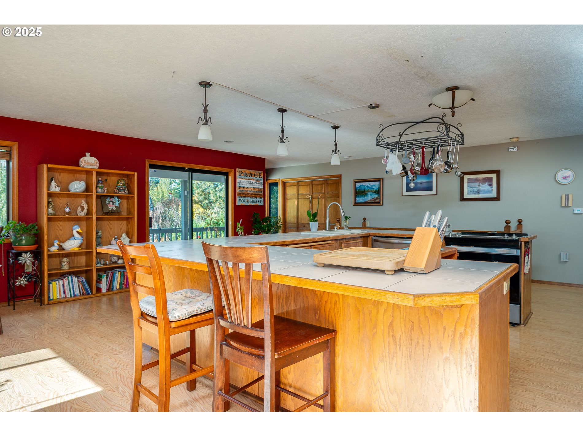 1963 Southwest Myers Place Gresham, OR 97080 - Photo 11 of 43 a view of a dining room with furniture and a chandelier