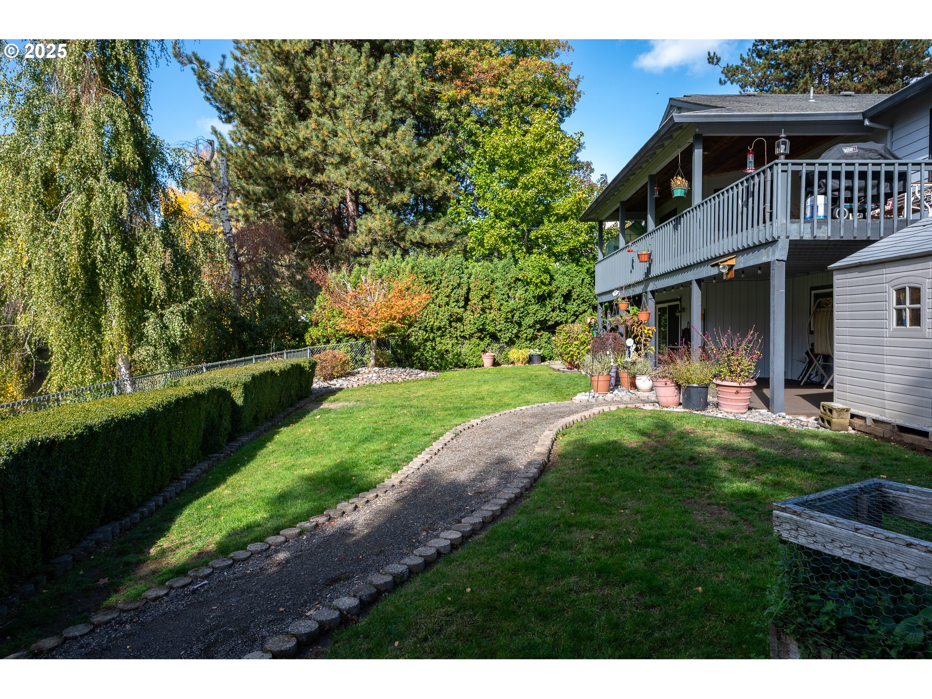 1963 Southwest Myers Place Gresham, OR 97080 - Photo 36 of 43 a front view of a house with a yard