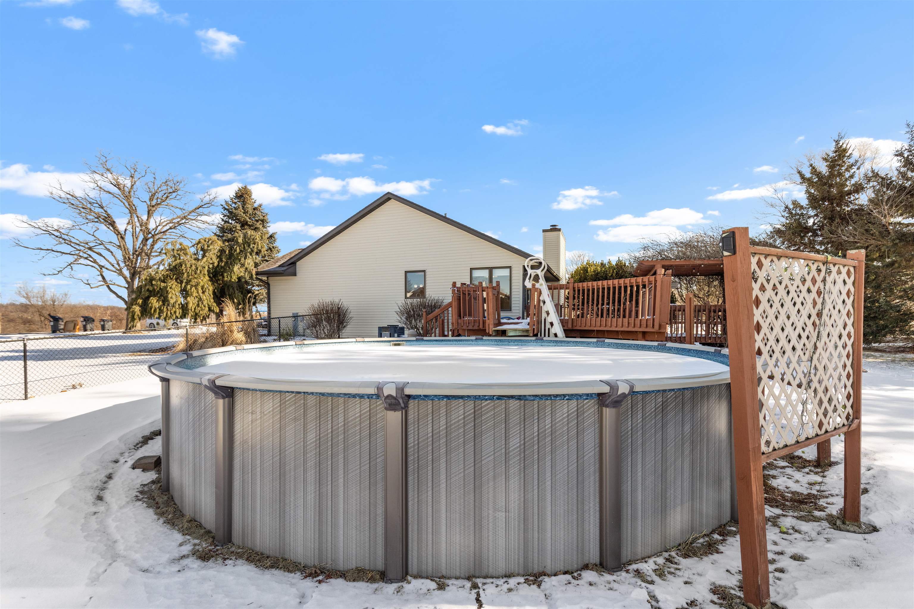 7467 McCurry Road Roscoe, IL 61073 - Photo 22 of 29 a view of a outdoor space with a patio and jacuzzi