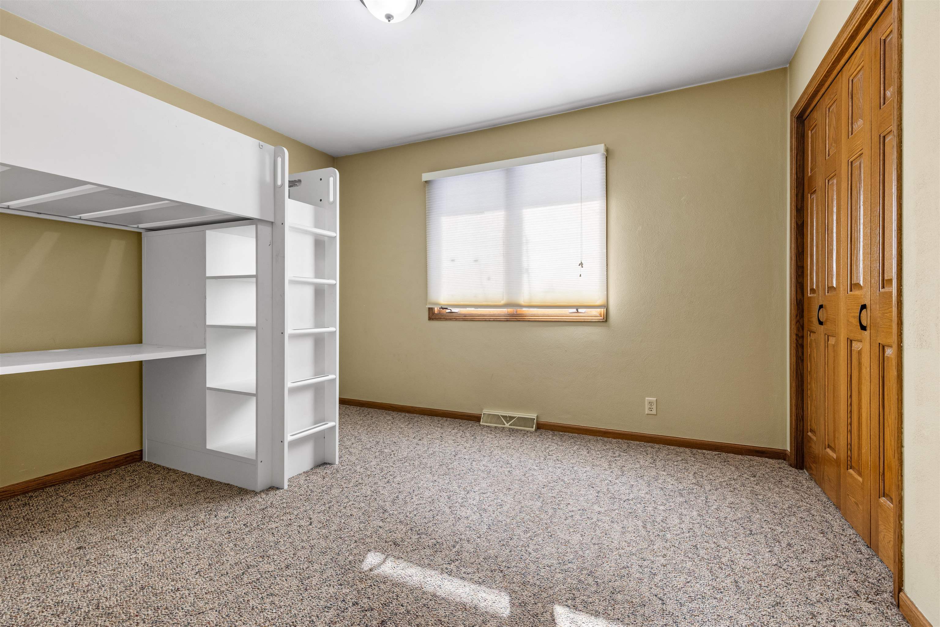 7467 McCurry Road Roscoe, IL 61073 - Photo 10 of 29 a view of an empty room with a window