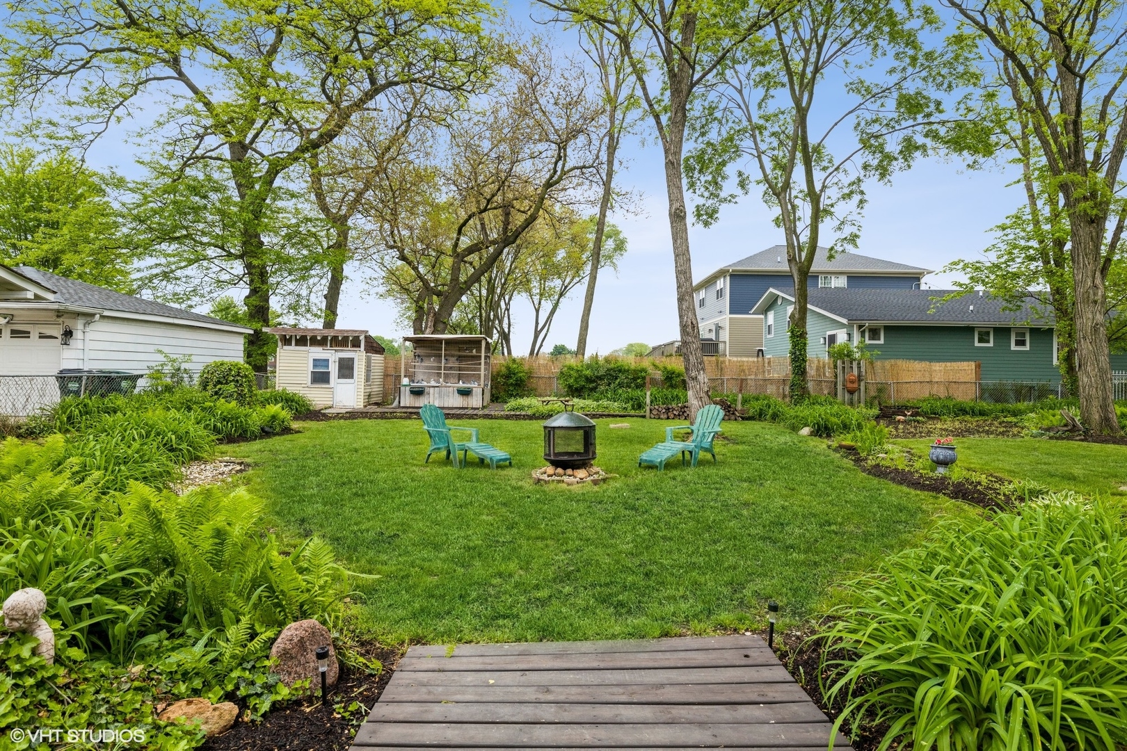 4331 Forest Avenue Brookfield, IL 60513 - Photo 14 of 15 a view of a house with backyard sitting area and garden