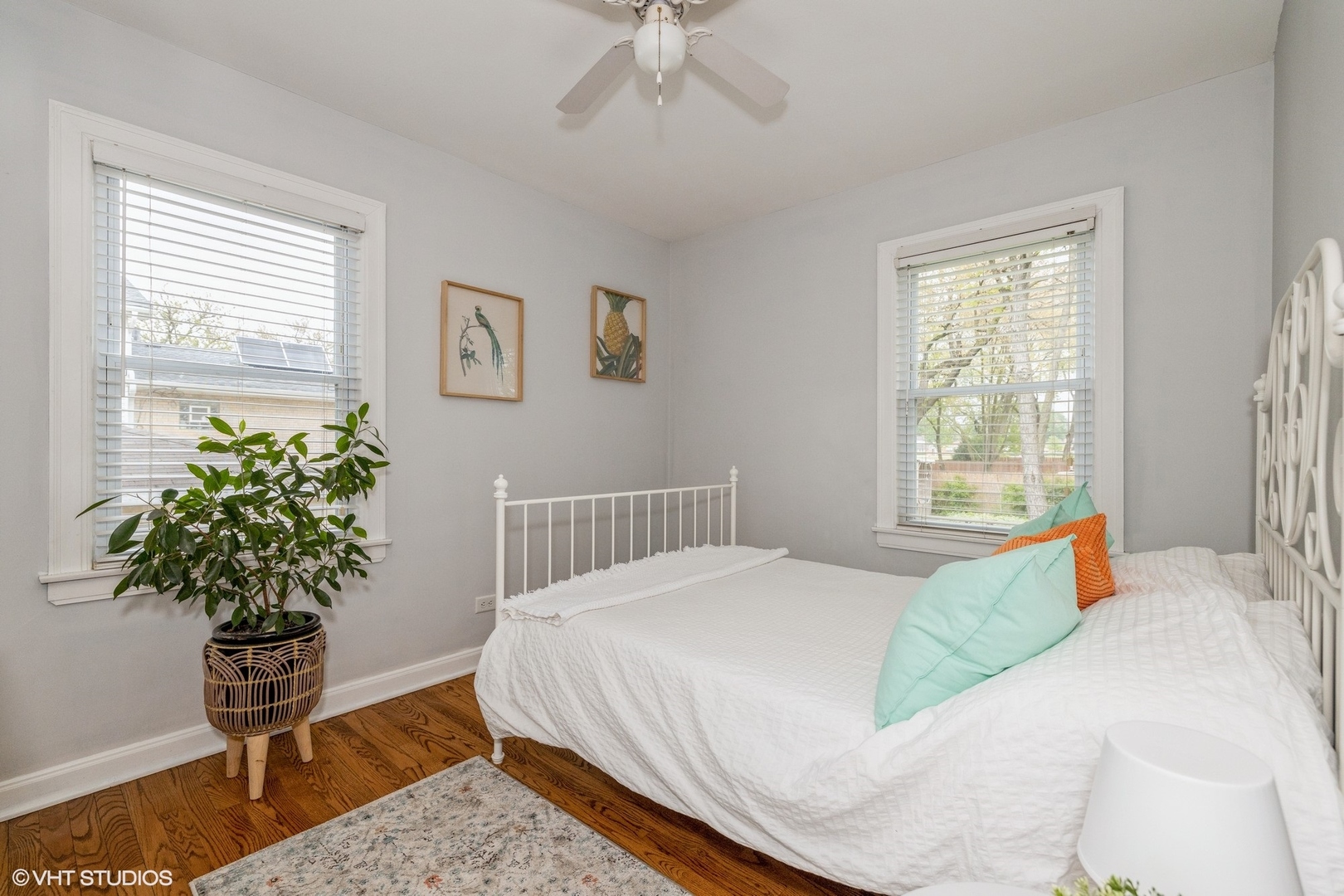 4331 Forest Avenue Brookfield, IL 60513 - Photo 6 of 15 a bedroom with a bed flowers and a window