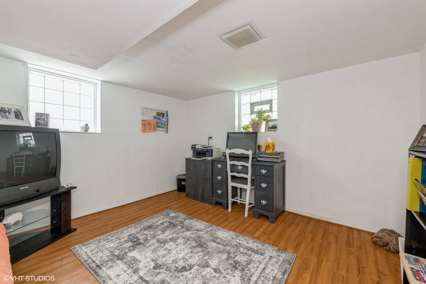 4331 Forest Avenue Brookfield, IL 60513 - Photo 10 of 15 a view of a workspace with furniture and a window