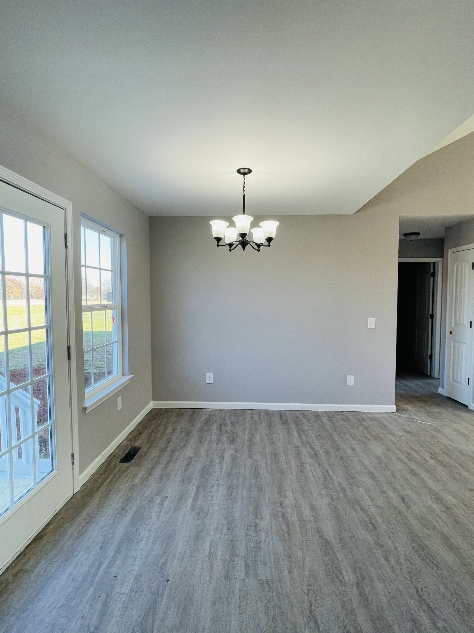 123 Vanatta Road Portland, TN 37148 - Photo 2 of 9 wooden floor in an empty room with a window