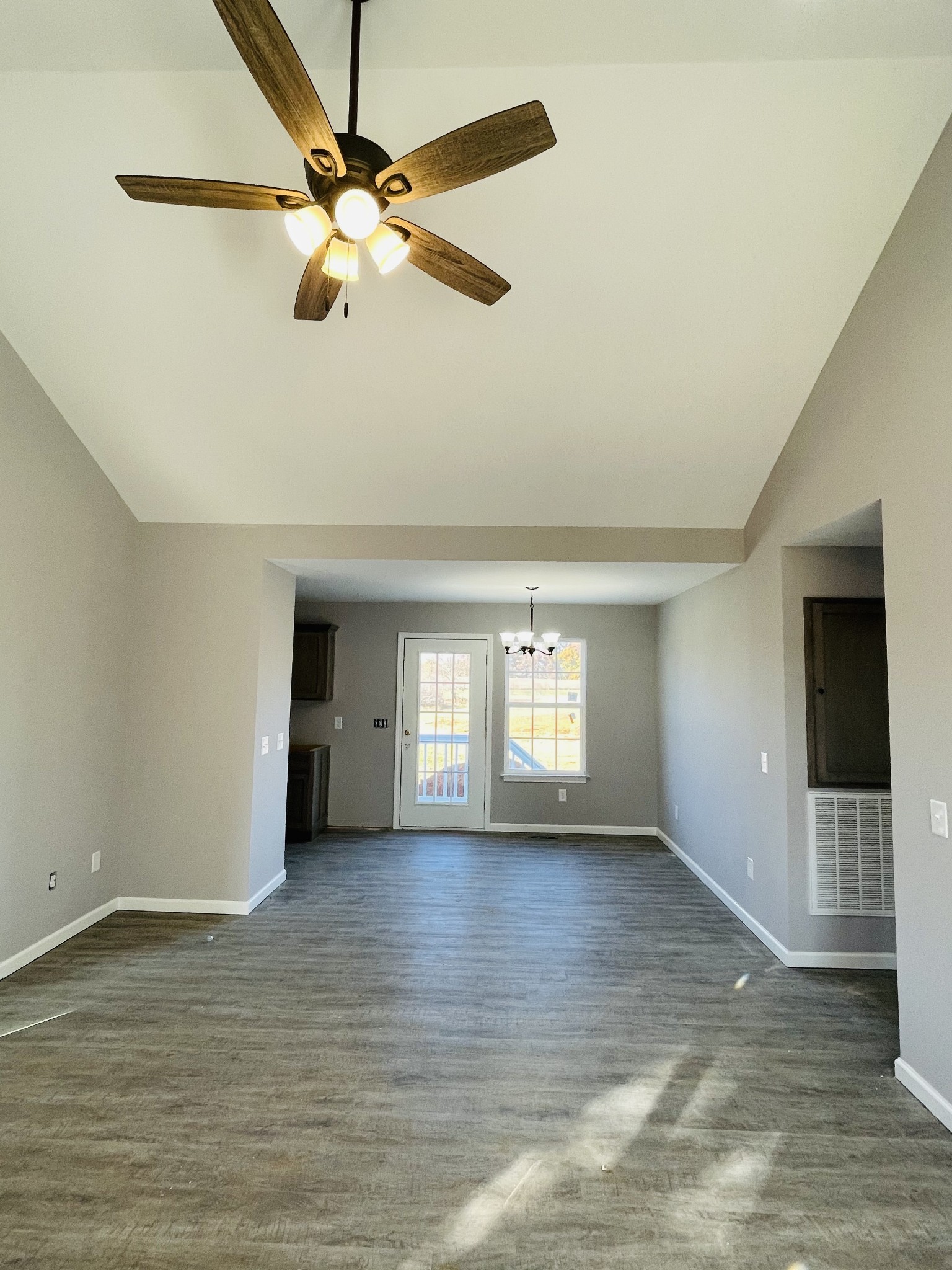 123 Vanatta Road Portland, TN 37148 - Photo 3 of 9 a view of an empty room with window and wooden floor