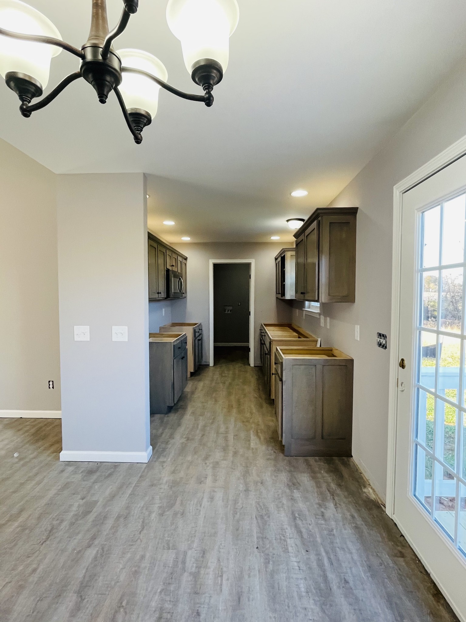 123 Vanatta Road Portland, TN 37148 - Photo 4 of 9 a kitchen with a refrigerator and a sink