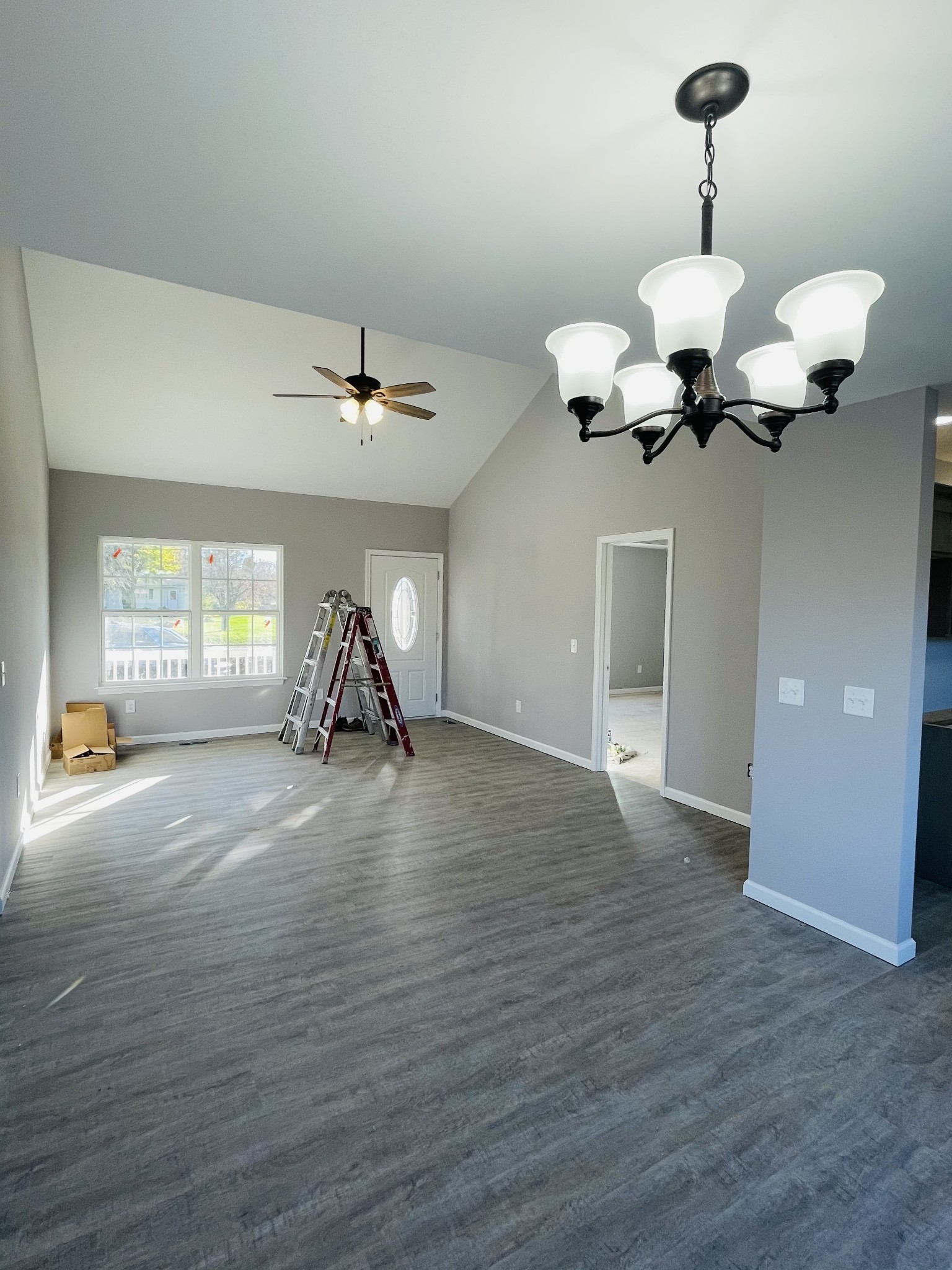 123 Vanatta Road Portland, TN 37148 - Photo 5 of 9 a view of a room with wooden floor chandelier and windows