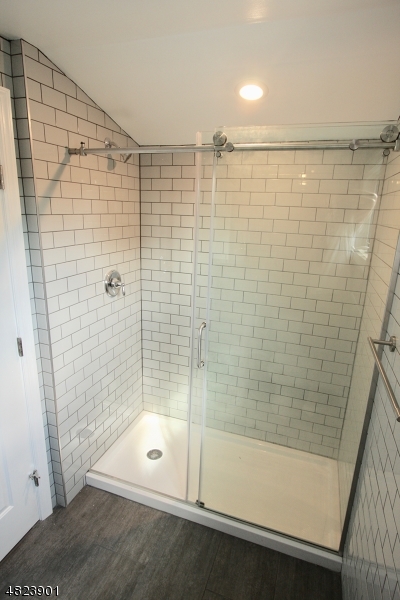 18 William Street, Unit 2 Summit, NJ 07901 - Photo 8 of 15 a bathroom with a shower and a bathtub