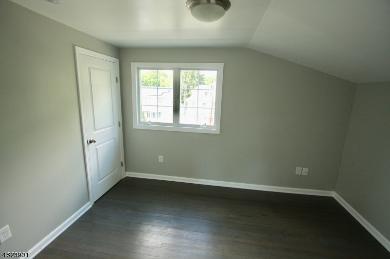 18 William Street, Unit 2 Summit, NJ 07901 - Photo 10 of 15 an empty room with a window