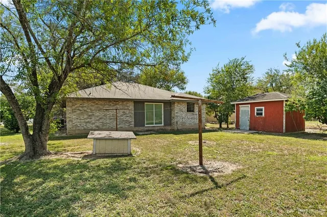 a view of yard with swimming pool