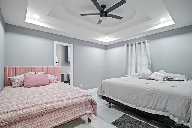 a kitchen with refrigerator a sink and cabinets