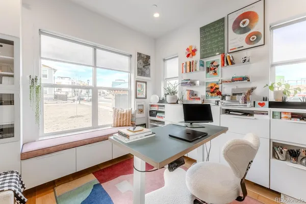 a room with furniture and a window